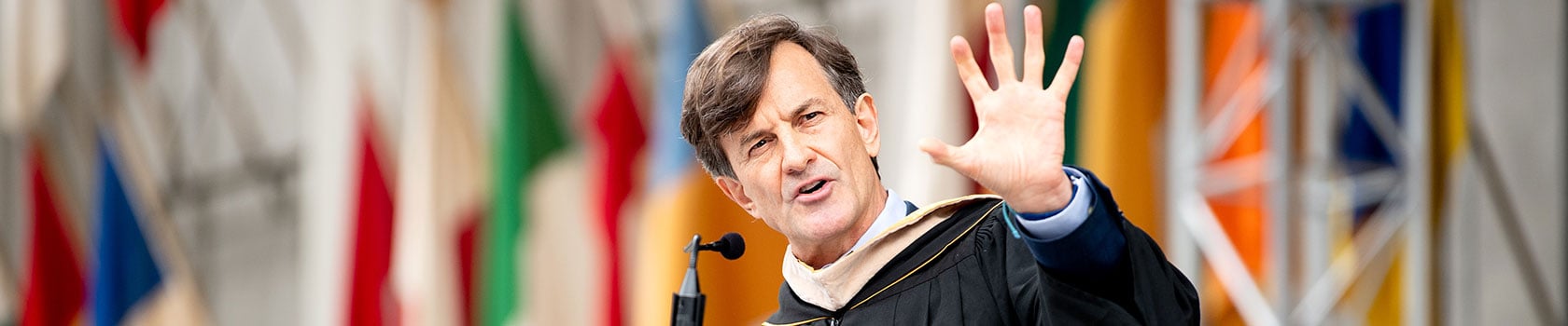 A man speaking at a graduation ceremony